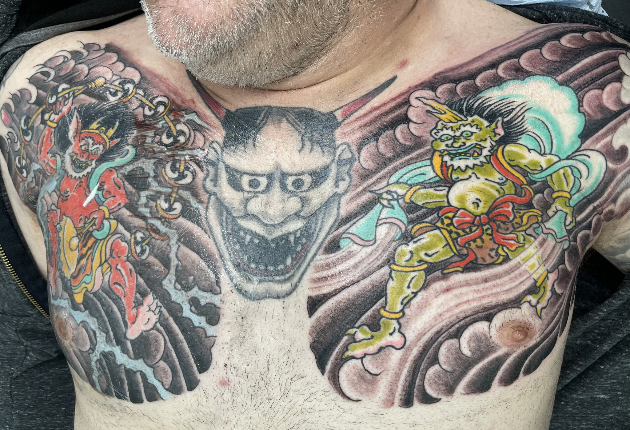 Japanese folklore chest piece wide by Dom at Last Hope Tattoo Company in Toledo