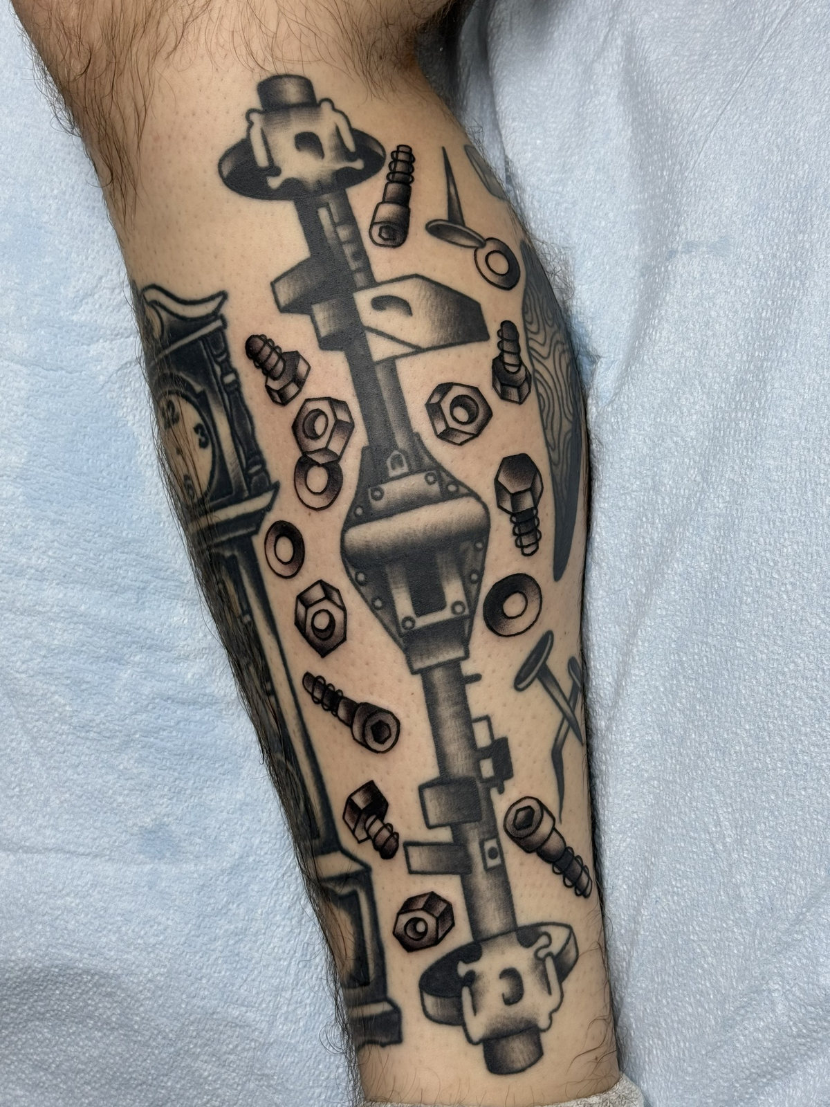 Black-and-gray mechanical forearm tattoo by Kara at Last Hope Tattoo Company in Toledo
