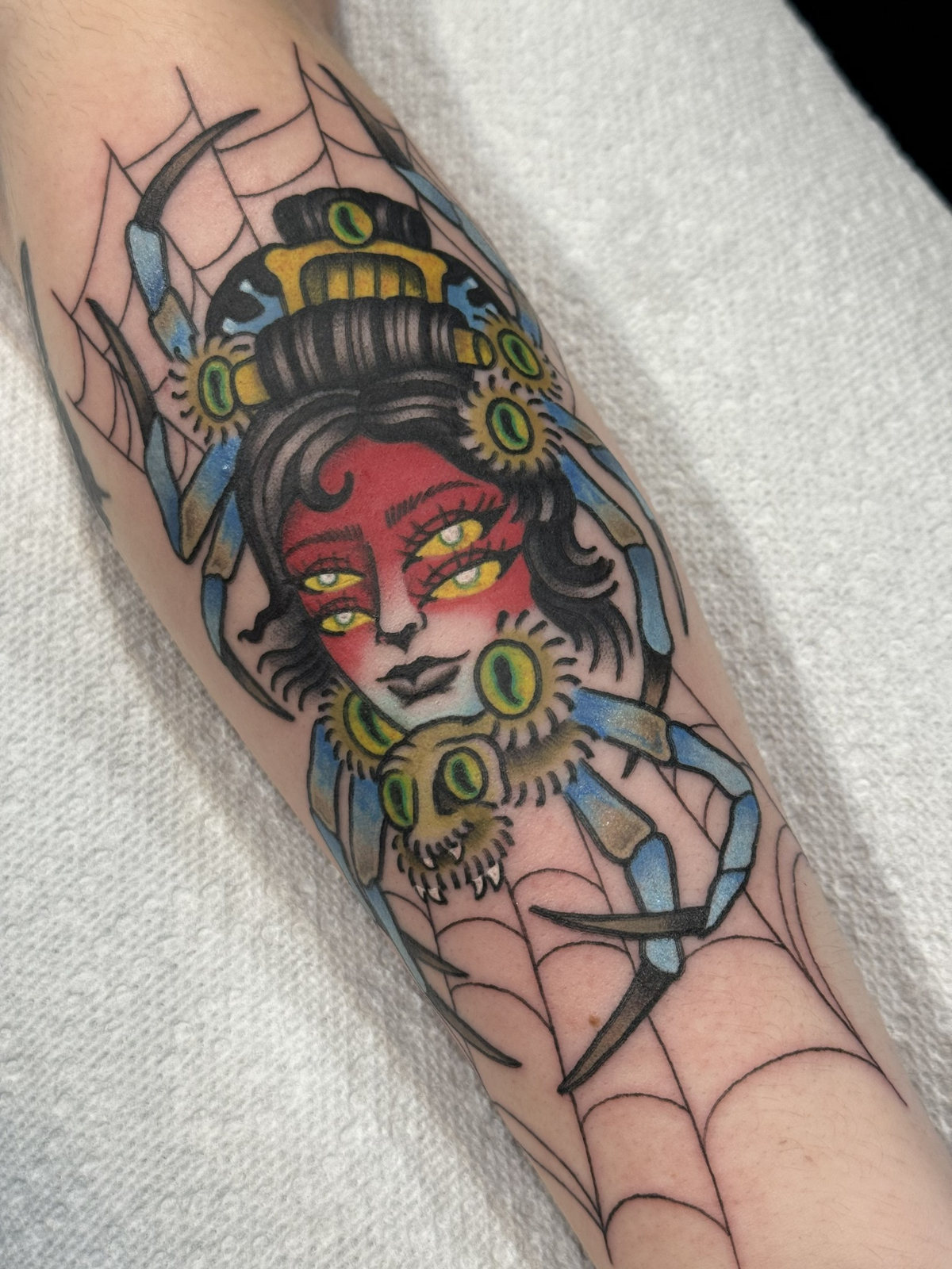 Color multi eyed woman spider tattoo by Kara at Last Hope Tattoo Company in Toledo