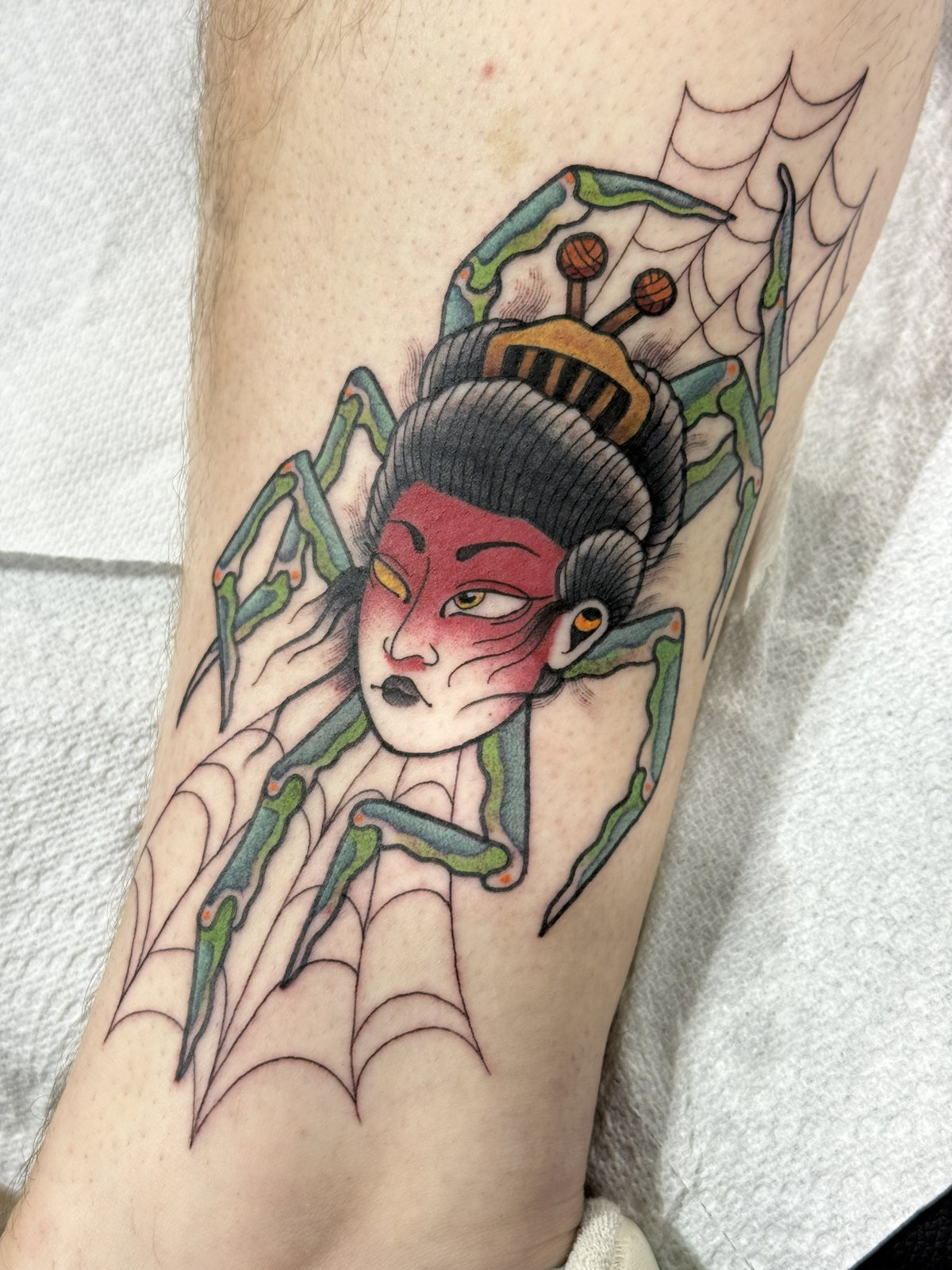 Color woman spider web tattoo by Kara at Last Hope Tattoo Company in Toledo